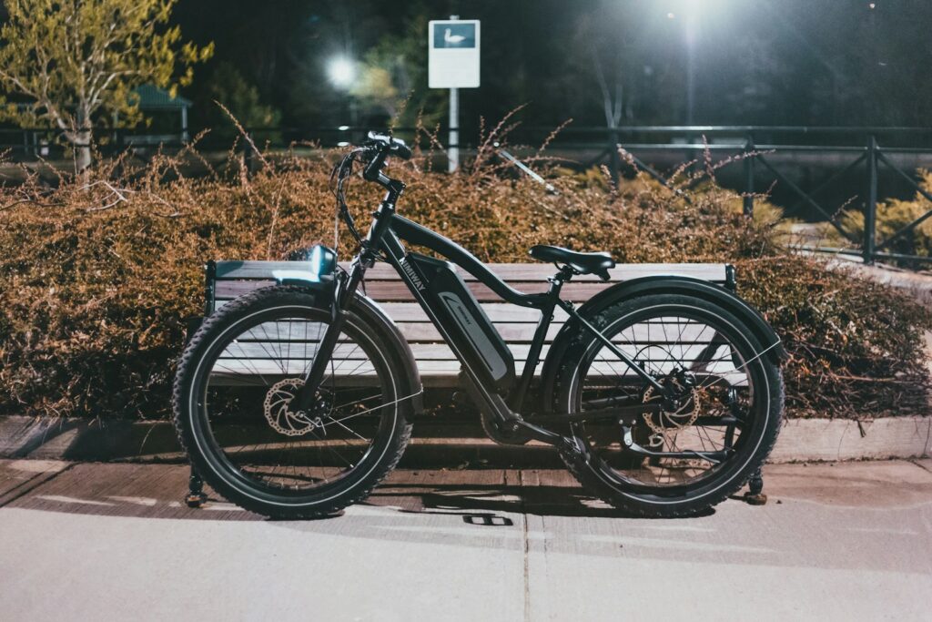 black and gray bicycle on road during daytime